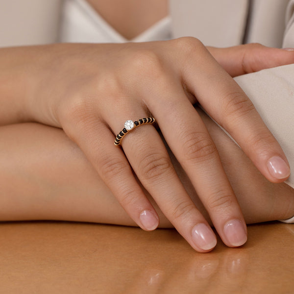 Elegant Simple Mangalsutra Ring in 92.5 silver with a cluster of American diamonds and traditional black beads.