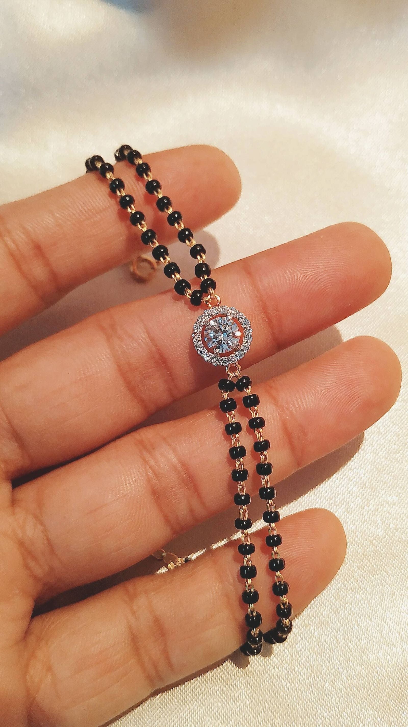 The Solitaire Story Mangalsutra Bracelet - RishiRich Jewels